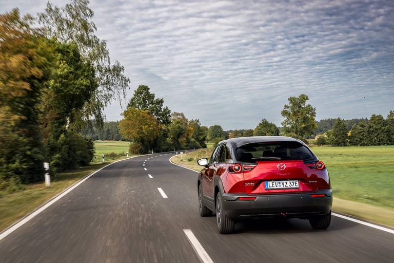 Mazda MX-30 R-EV (2023) dynamic, rear view